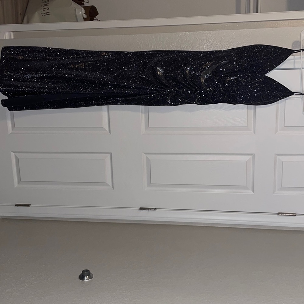 Long  black with silver glitter that does not fall of 100% polyester. M